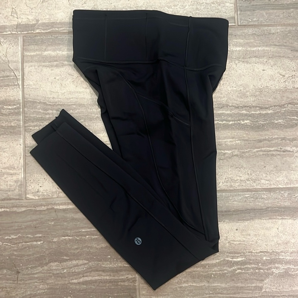 Lululemon black leggings, size 4